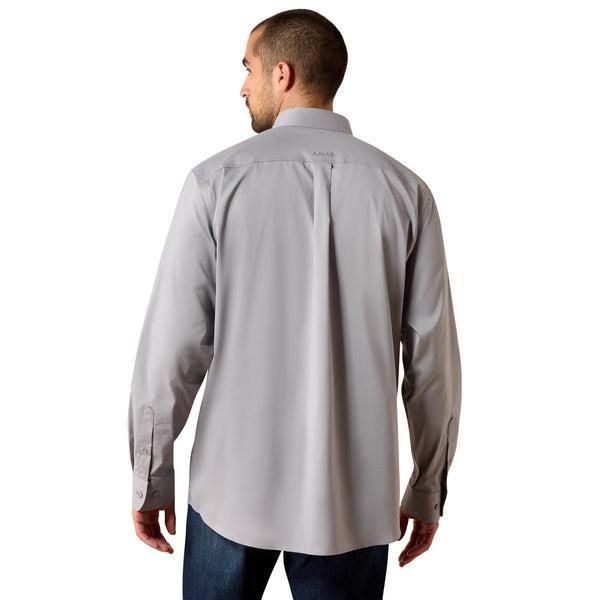 Man wearing a gray dress shirt 