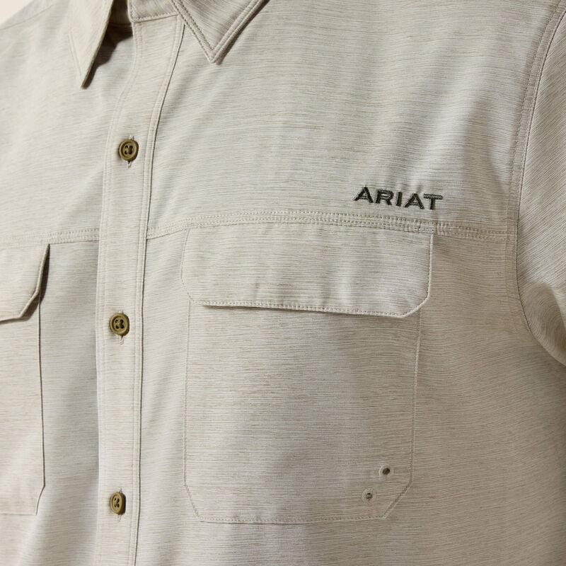Light-colored, short-sleeve shirt.