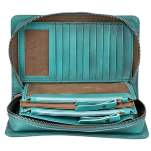 Open teal leather wallet with multiple compartments on a white background