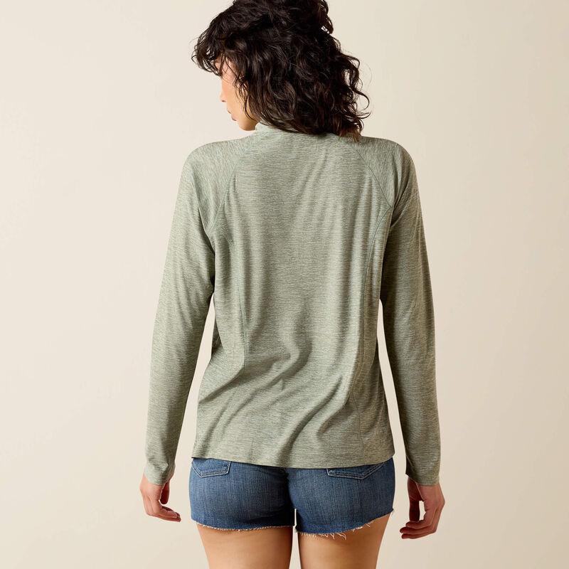 A green, long-sleeved shirt featuring the brand logo.