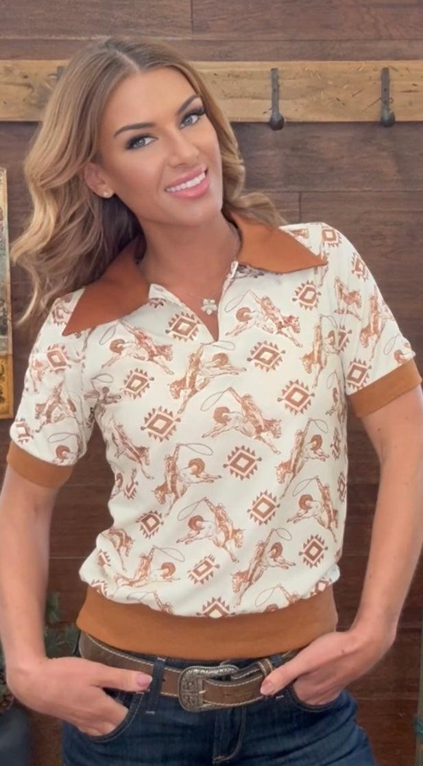 Woman wearing a patterned shirt with a blurred background