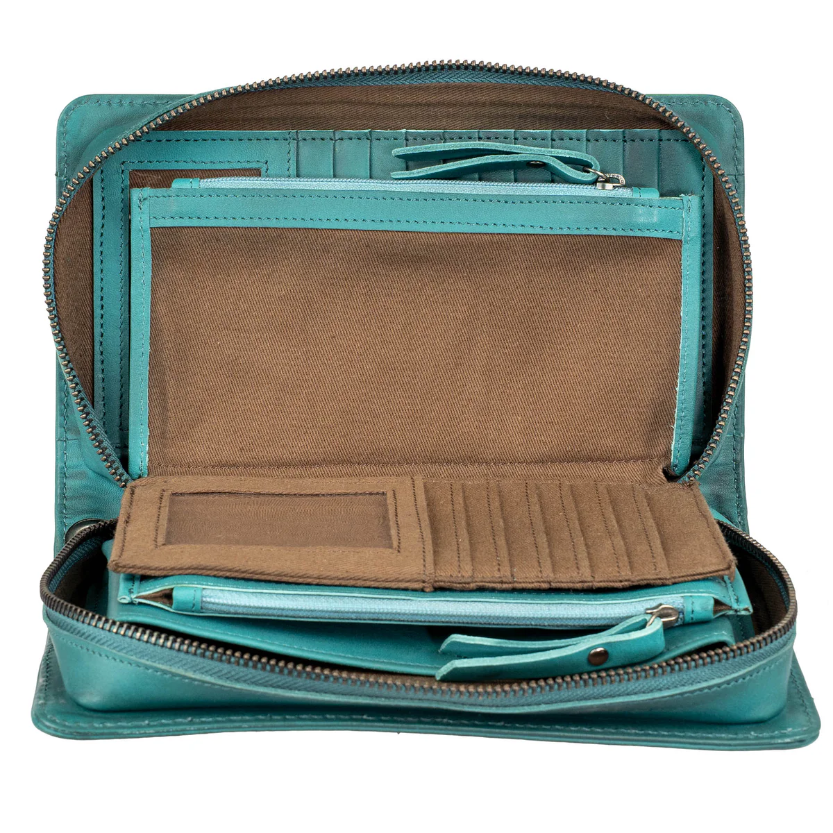 Teal leather travel bag with open compartments on a white background