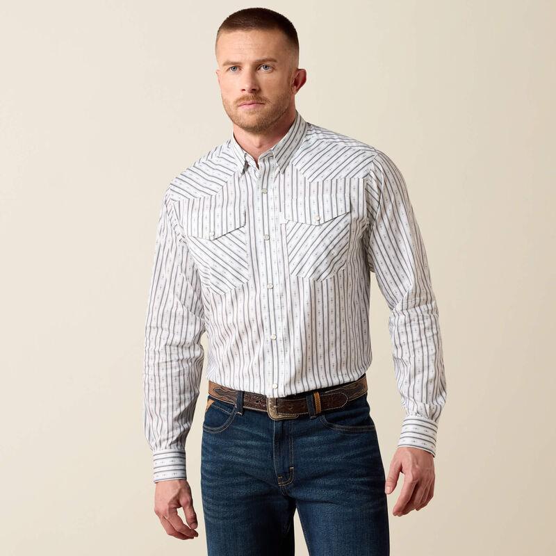 A man wearing a long-sleeve western-style button-down shirt with thin vertical blue and white stripes