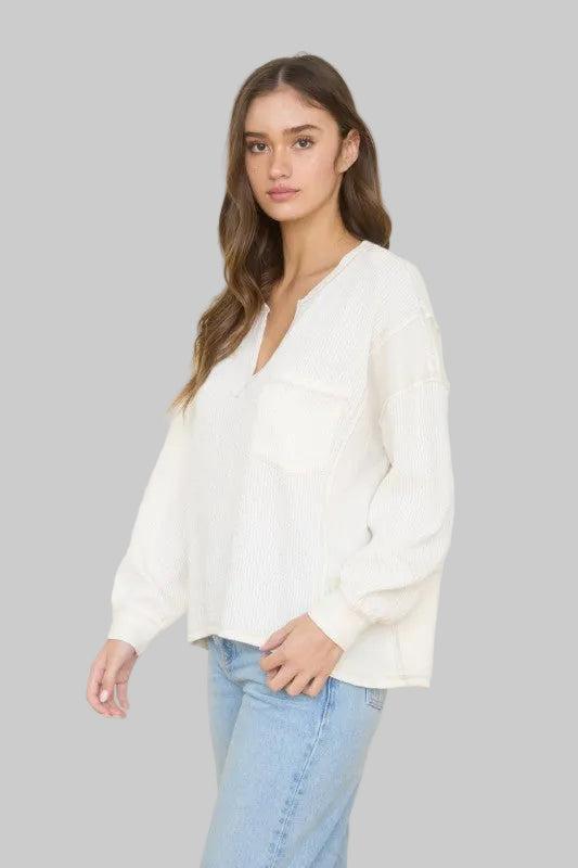 Woman wearing a Ivory sweater