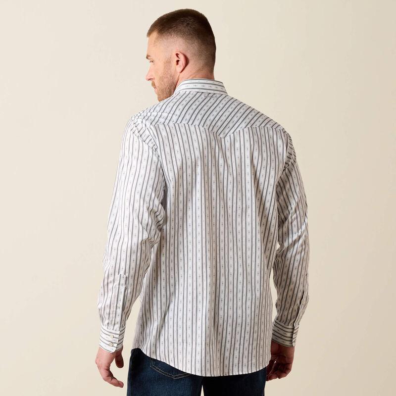 A man wearing a long-sleeve western-style button-down shirt with thin vertical blue and white stripes