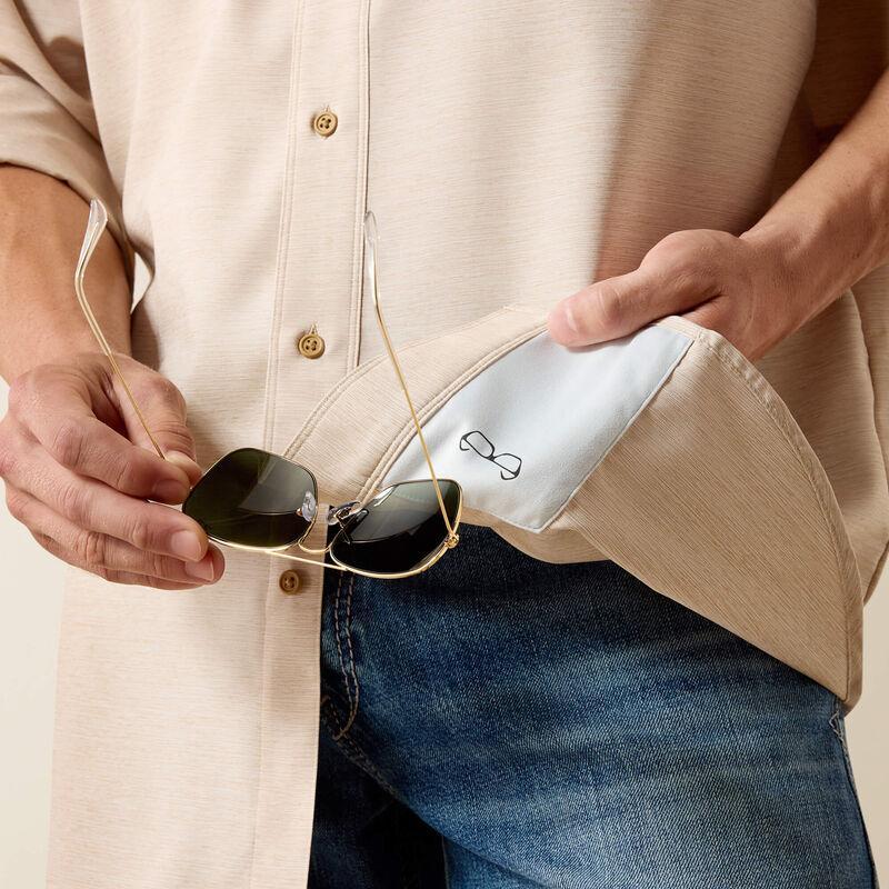 Long sleeve beige btton up shirt.