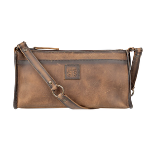 Brown leather crossbody bag with visible brand logo on a white background