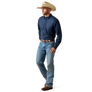 Man wearing a blue patterned shirt 