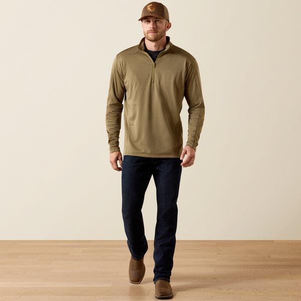 Man wearing a dusky green quarter-zip pullover